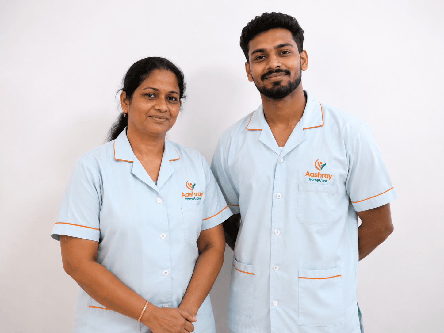 An Aashray nurse and caretaker